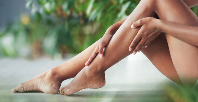 woman legs on green background