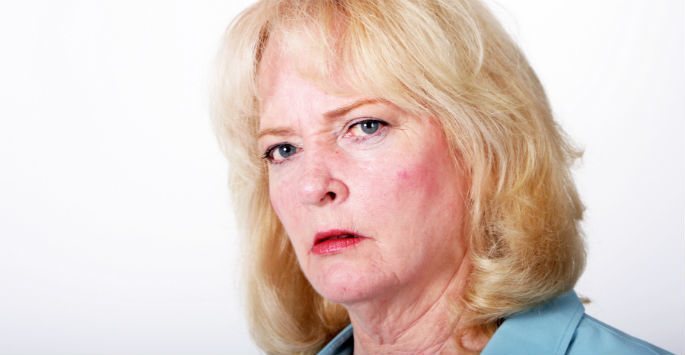 Mature woman with angry face