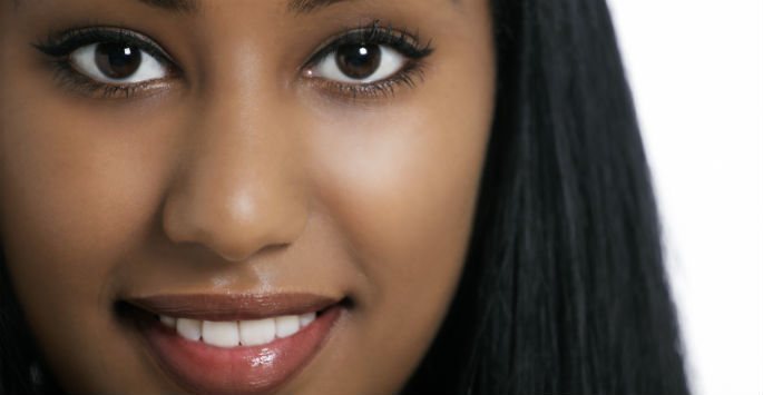 Black female with smooth facial skin