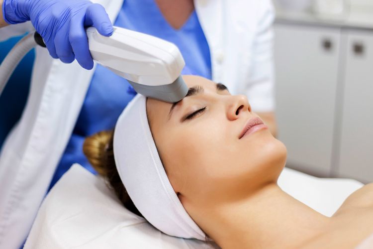 Woman receiving Intense pulse light treatment and therapy for skin