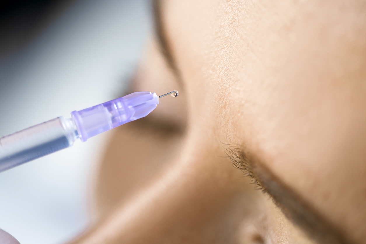Girl receiving hyaluronic acid treatment