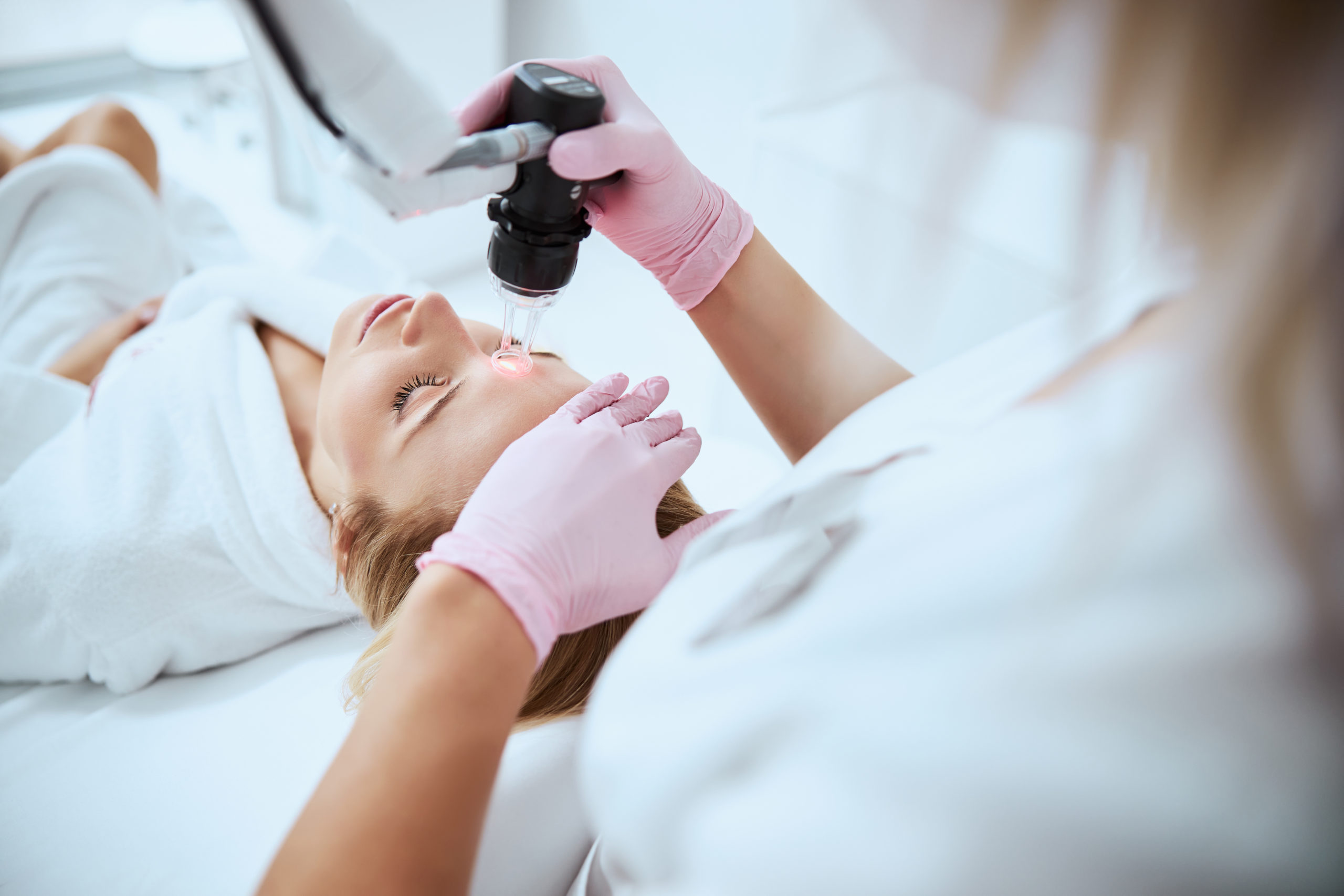 Woman receiving Intense pulse light treatment and therapy for skin